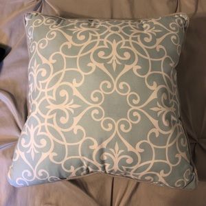 Detailed light blue throw pillow